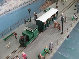 Petrol locomotive and Hudson cross bench trailer